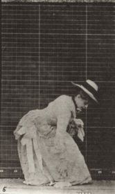 Plate 211 Stooping and lifting a handkerchief, a parasol in left hand — figure reference